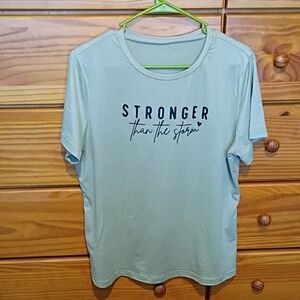 🤑Stronger Than The Storm Light Green T-Shirt.